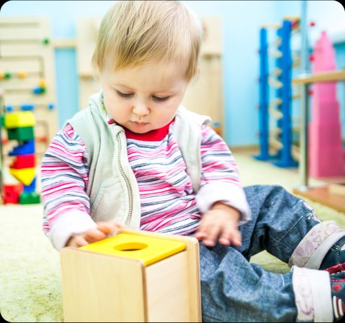 Toddler drawing rainbow