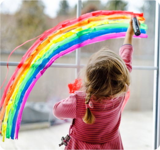 Toddler drawing rainbow